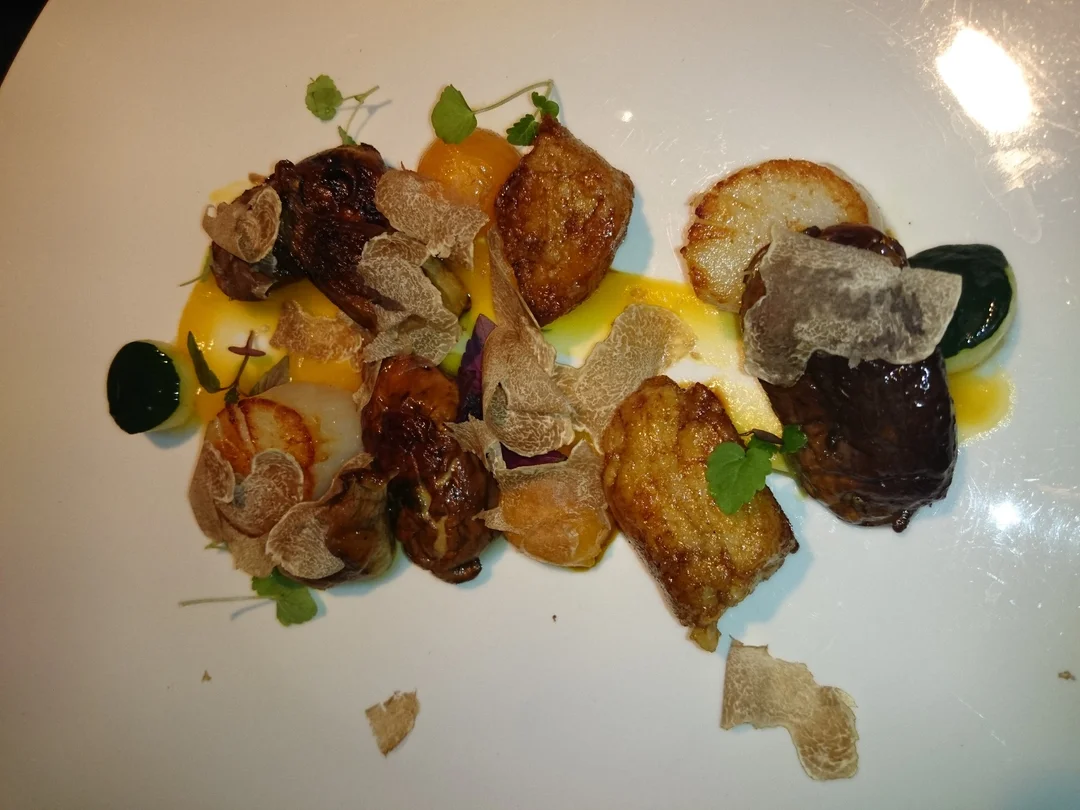 scallops, veal sweetbreads, grilled porcini mushrooms and