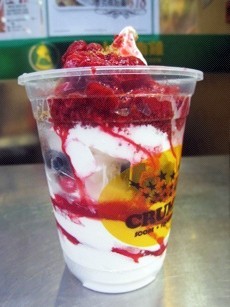 Large froyo with raspberry, blueberry and crumbs