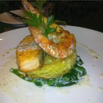 Salmon and prawn on fried angel hair and spinach