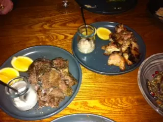 Spit roast chicken and slow cooked lamb