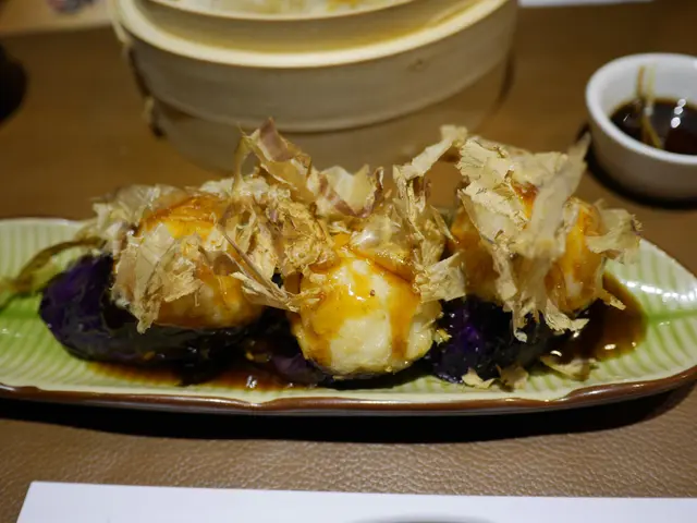 Japanese Style Sauce w/Cuttlefish in Eggplant ($20)