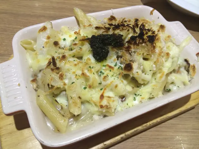「黑松露野菌地雞焗長通粉 $76」
