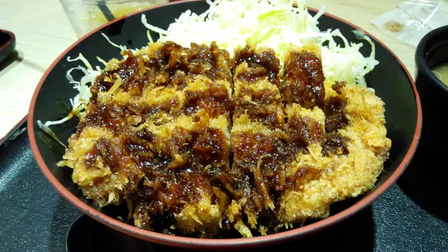 如果要排名⋯生菜絲>飯>吉列豬扒⋯你明的