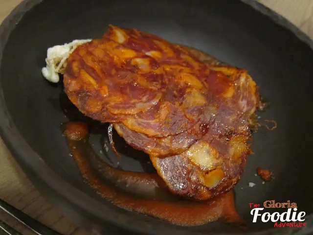 Fried Organic Egg with Sliced Iberico Chorizo and spicy tomato sauce