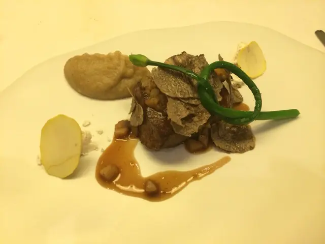 Seared venison with shaved black truffles and chestnuts