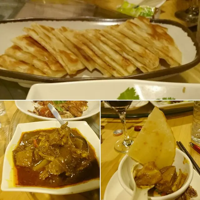 屬於店內的招牌作之一,同桌還有十二件香脆的家常餅,平心而論,這裡的清新咖喱汁膽,還是稱得送香濃惹味,再配以炆得腍化的羊腩鮮薯,不愧為店內的招牌作。