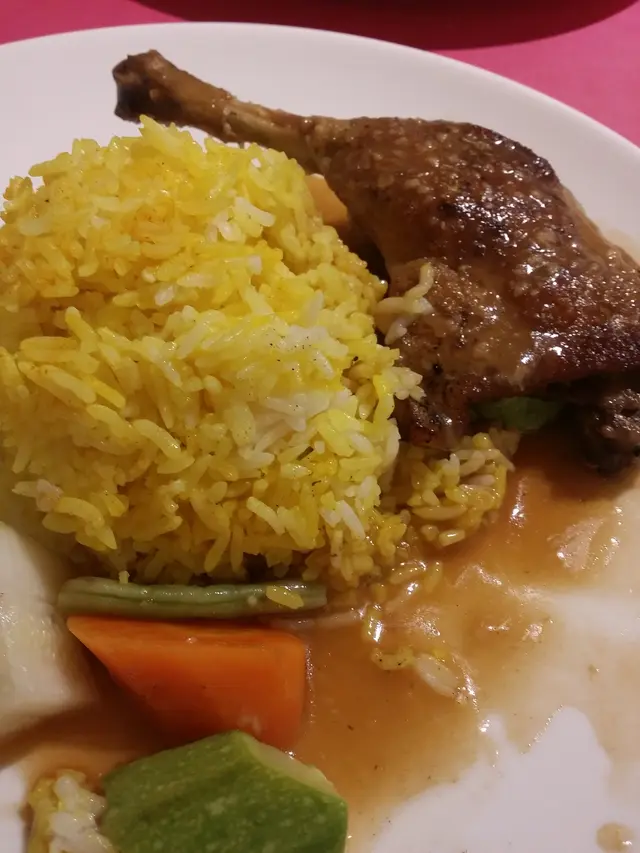 法式油封鴨腿配黃薑飯