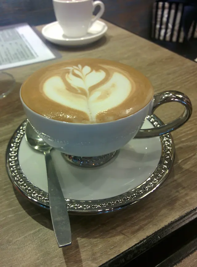 滿滿的, 會心的. 未喝, 已經心滿意足了. 