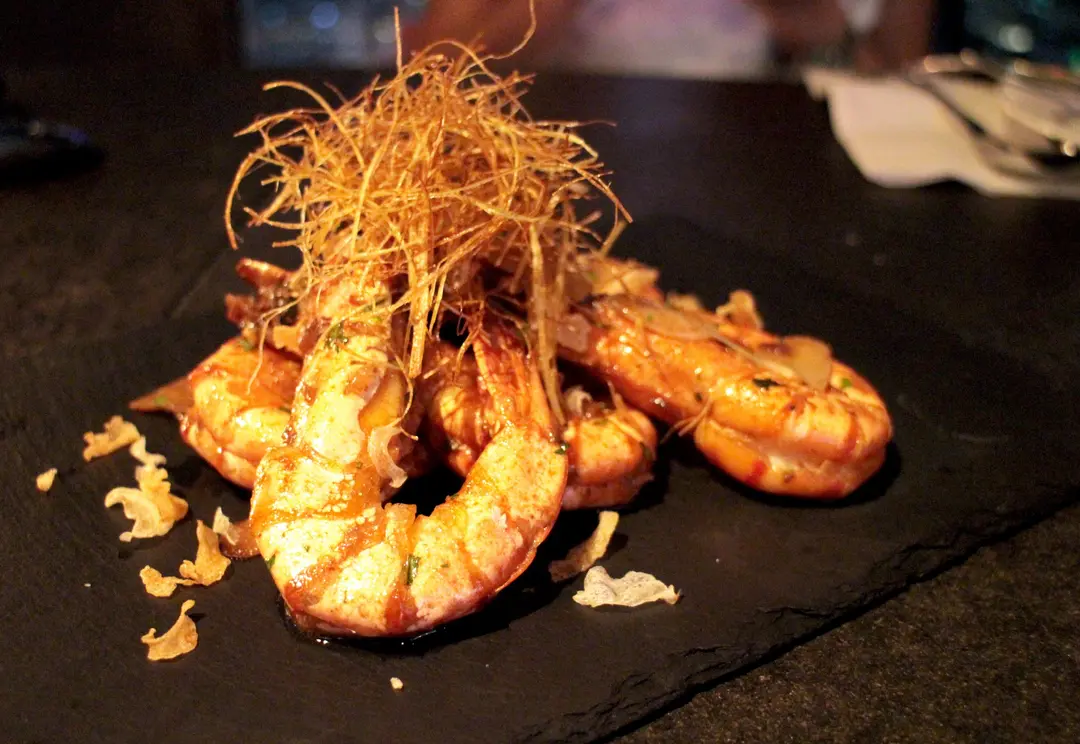 sauteed tiger prawns with confit garlic