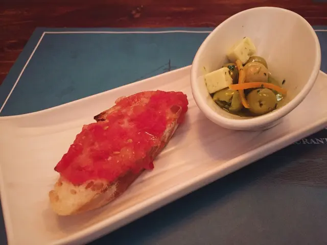 A Selection of Marinated Olives, Cheese & Bread w/ Tomato