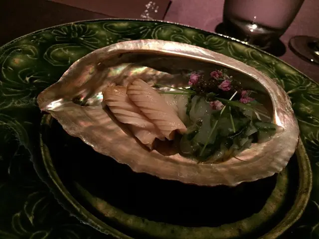 Cold noodles topped with white shrimp, caviar, abalone and abalone liver sauce