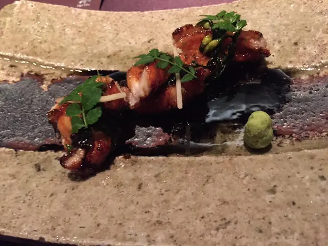 Wild eel plaited with chives and grilled on charcoal