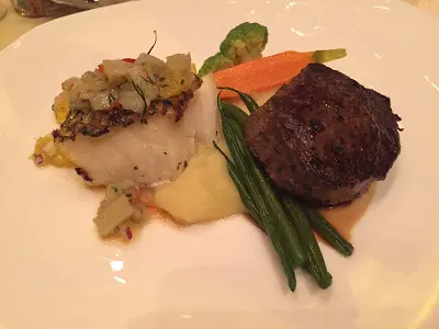 Braised Chilean Seabass on Potato Purée, Citrus and Fennel, Beef Medallion, Natural Jus