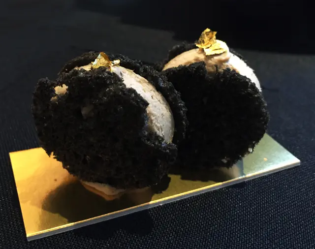 Squid ink toast with sardine tartare