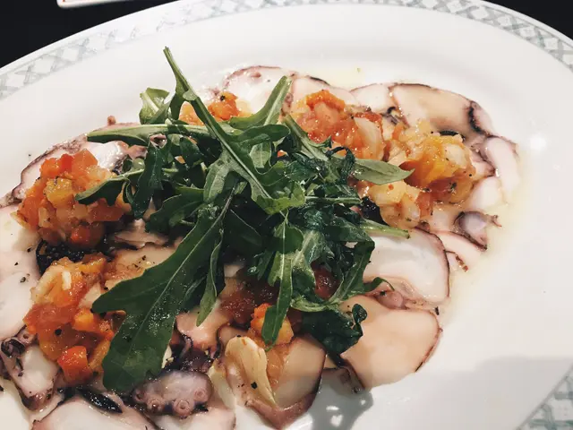 – Octopus Carpaccio w/ tomato, spanish onion & baby capers olive oil