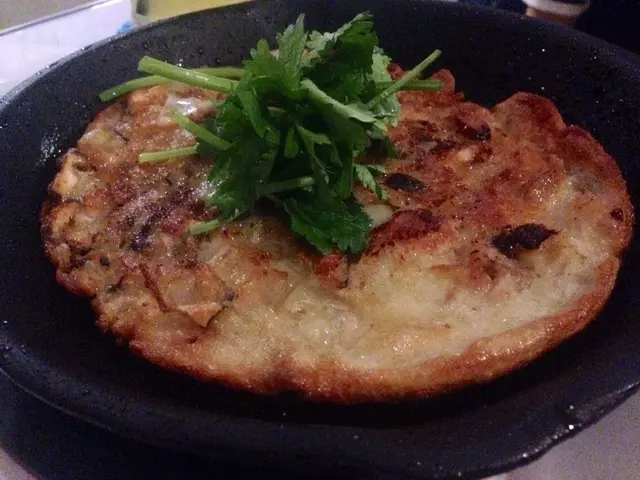 蠔餅中的油依然沸騰