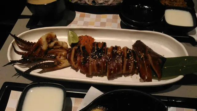 $20一條大魷魚，點一份附送的七味粉，好味