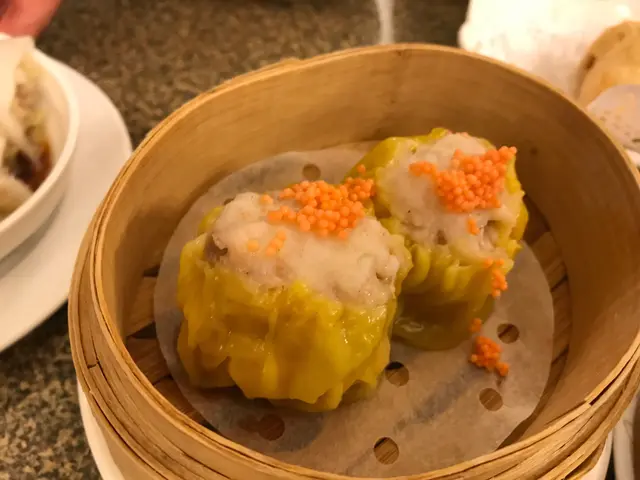 Dumpling was massive, juicy, and covered with crab roe.