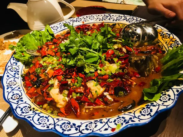 水煮桂花魚  （價錢🙈，魚太多骨，唔夠滑, 味道一般）