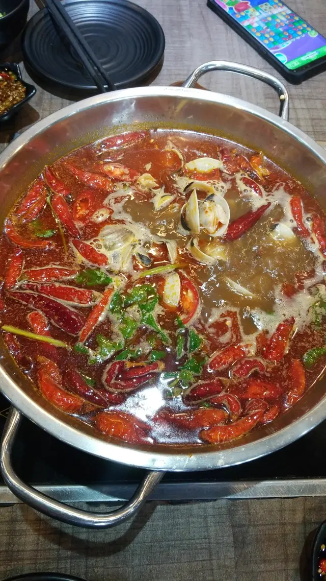 麻辣地獄貝貝煱，味唔錯，但啲貝貝好多沙