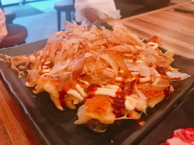 大量的木魚沙律醬和燒汁，實在美味