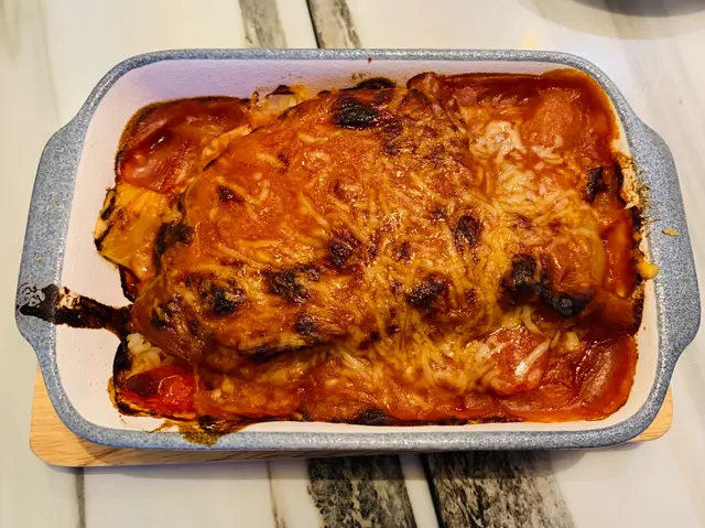 番茄菠蘿焗厚切黑毛豬扒燴飯