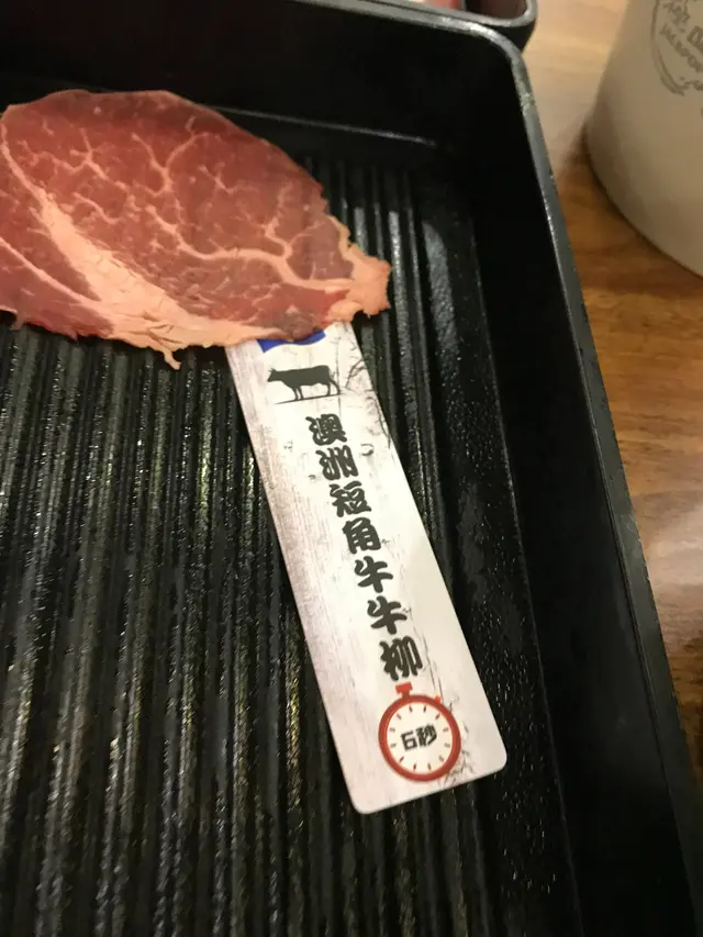 每盤牛都有sticker教你點煮才最好食