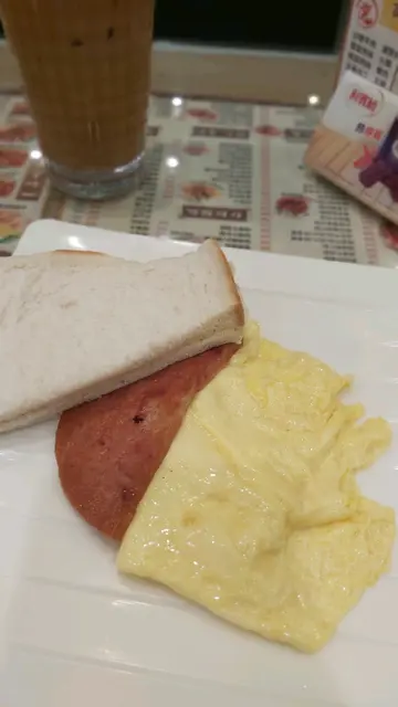 scramble eggs luncheon meat and buttered bread