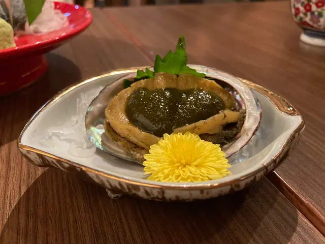 口感煙韌,味帶煙燻,配以鮑魚肝醬,心思難得,吁道上成