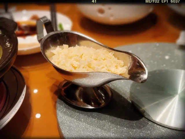 海鮮鴨湯泡飯（$198）：脆米