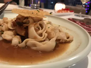 Cuttlefish tagliatelle in “carbonara” style with crispy parmesan
