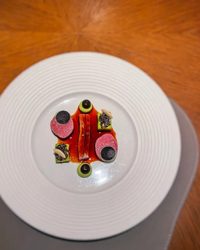 Milk Fed Lamb Loin° Black Winter Truffle° Violin Zucchini° Avocado° Celtus° Almond°