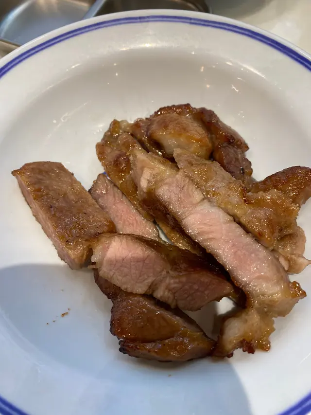 再加熱左嘅豬扒,深色左