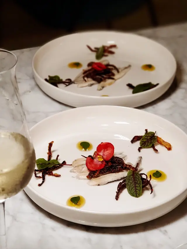 Mediterranean Anchovies in Sour Sauce “Carpione”, Crunchy Red Onions, Sicilian Organic Honey Emulsion