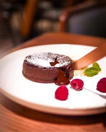 70% Molten Chocolate cake with vanilla ice cream