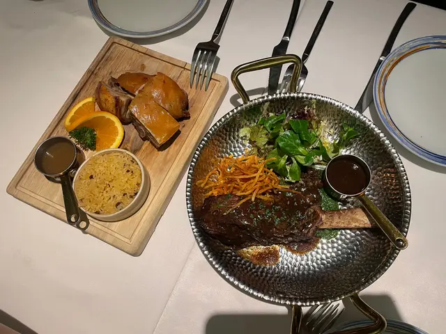 Slow braised USDA beef short ribs, spinach Esparregado, grass potatoes, caramelized shallots  +  Traditional roasted suckling pig “bairrada” style