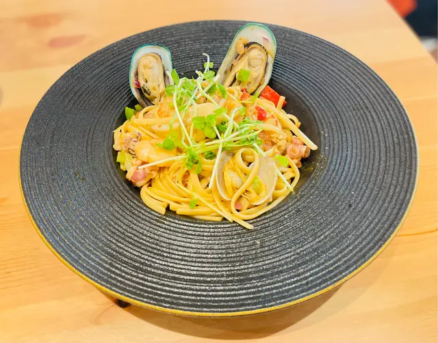 秘製冬陰功海鮮炒意粉