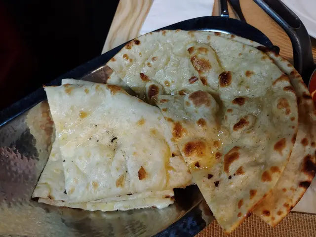 Butter Roti ($18) / Cheese Naan ($28)