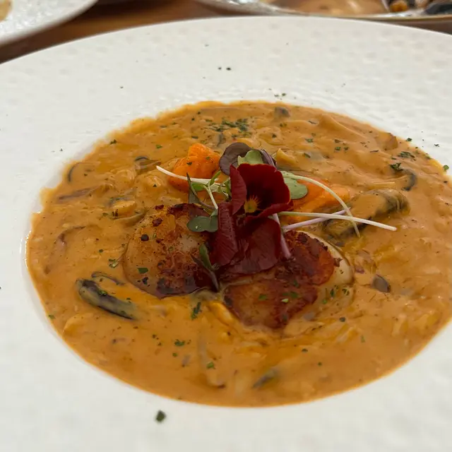 Massaman Curry Risotto with Sea Urchin and Hokkaido Scallop