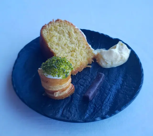 Desserts  -  cannoncini,  cake  with  clotted  cream,  orange  peel  coated  in  chocolate  