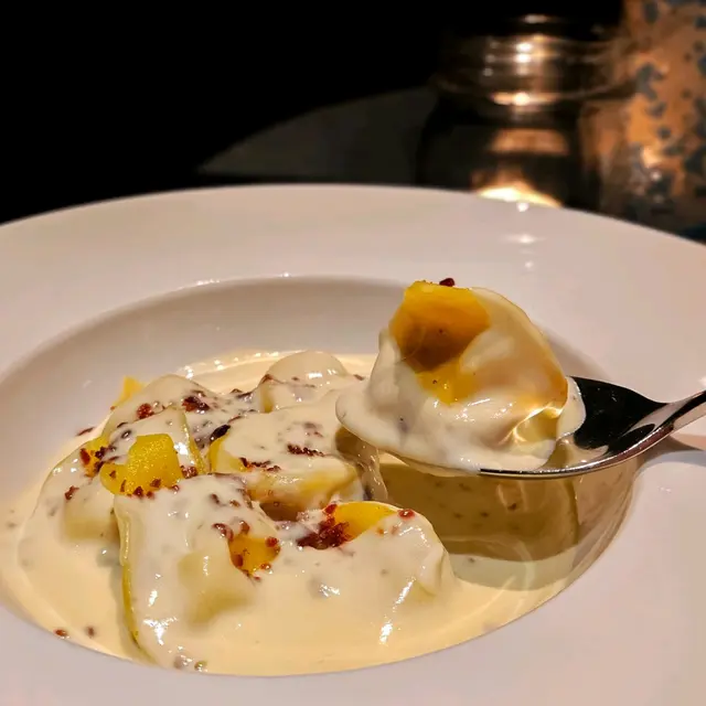 Homemade Tortellini Filled with Carbonara, Parmesan Sauceand Crispy Guanciale 