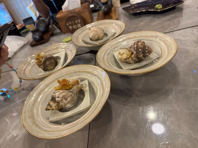 陣陣炭燒香，螺肉嫩滑多汁，配啲微酸醬，食落好開胃。