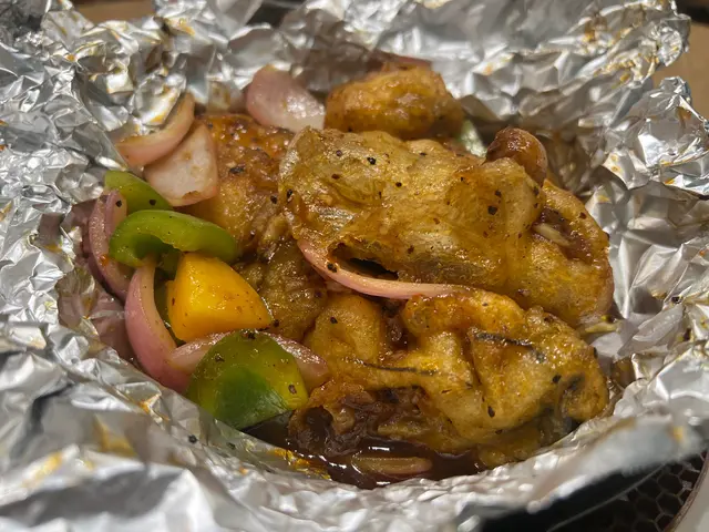 對我嚟講太油，但係星加坡人很喜歡￼