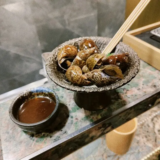 味辛黑梅螺