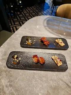 牛油果金槍魚咸蛋酥、龍眼蜜燒西班牙黑豚叉燒、巴旦木焗南瓜件