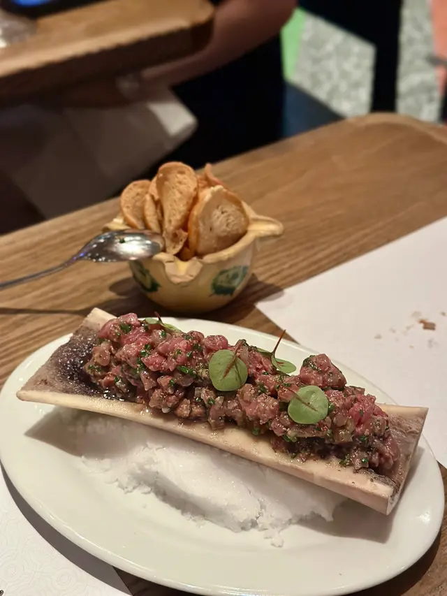 Wagyu steak tartare on charred bone marrow