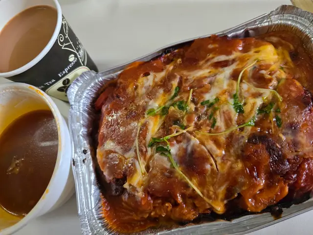 香濃芝士焗鮮茄豬扒飯