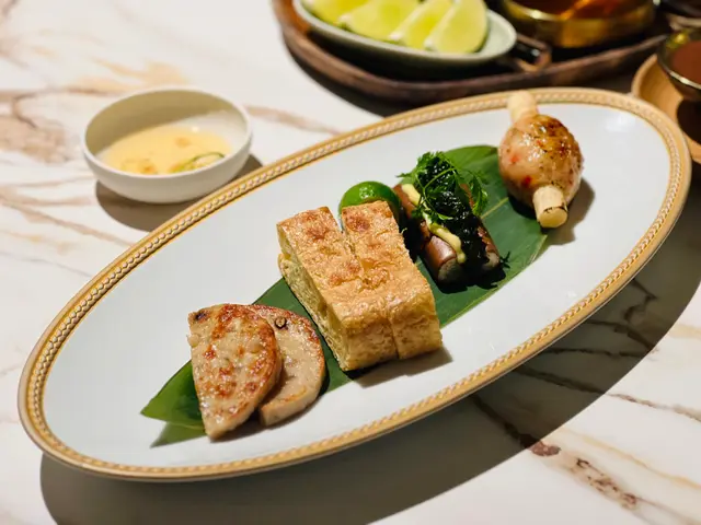 sugarcane • red prawn | woodfired • homemade Vietnamese ham | hanoi tofu puff • shrimp paste | iberico meatball • betel leaf