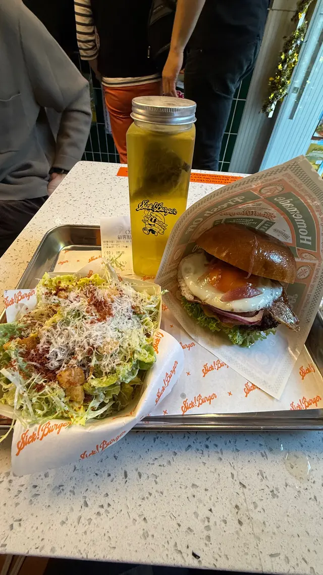 Signature burger single with Caesar salad